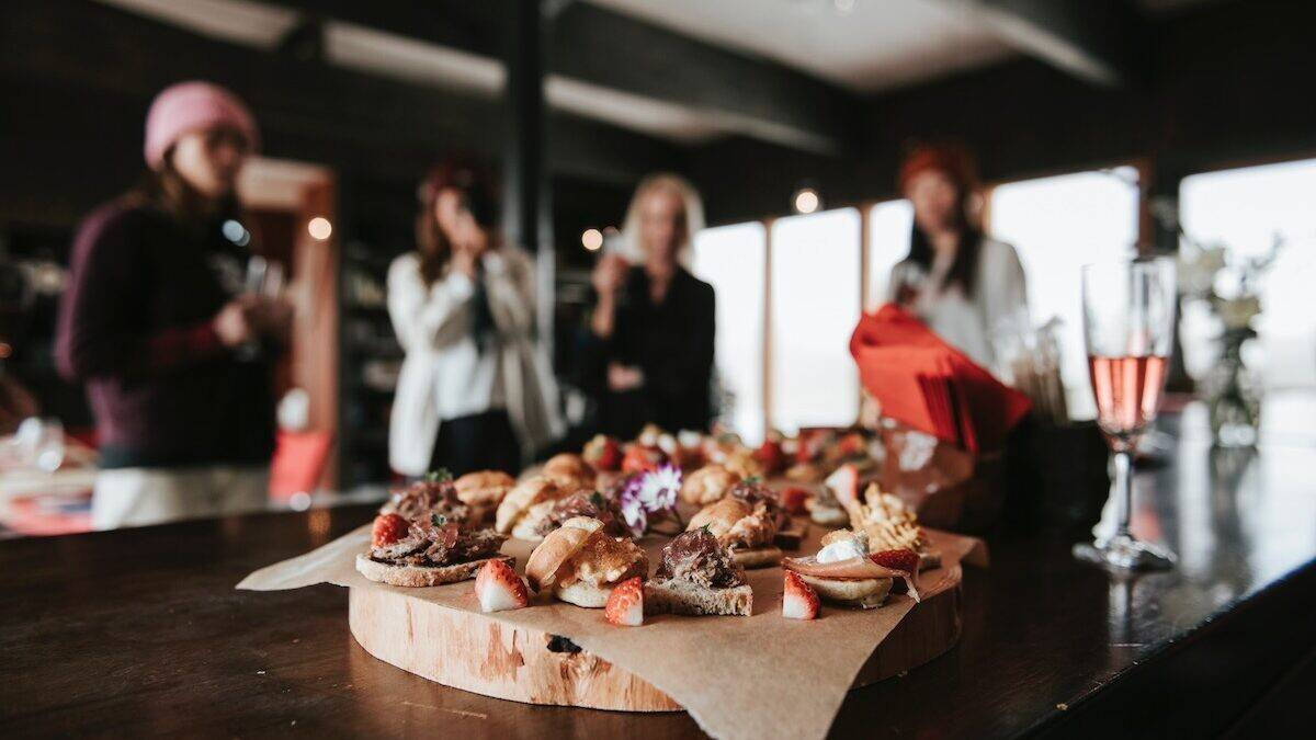Guests cooking together in the Barn Kitchen